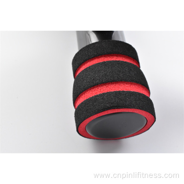 Portable push up bar with foam grip.
